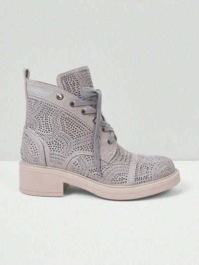 Elevate your fashion game with Geometric Chic, the perfect addition to any trendy woman's wardrobe. These <a href="https://canaryhouze.com/collections/women-boots" target="_blank" rel="noopener">boots</a> combine geometric design with high fashion for a truly stylish look. Stand out from the crowd and make a statement with these fashion-forward boots.