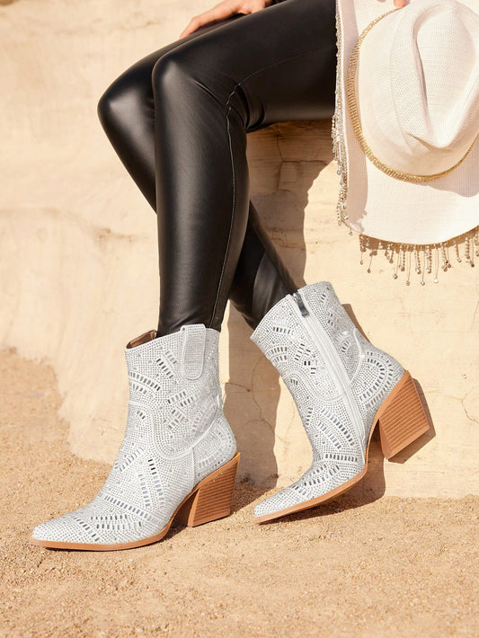 Add some sparkle and shine to your wardrobe with our Rhinestone Cowboy Ankle <a href="https://canaryhouze.com/collections/women-boots" target="_blank" rel="noopener">Boots</a>. These statement boots feature eye-catching rhinestones and a trendy cowboy-style design. Perfect for adding a touch of glamour to any outfit. Feel confident and stylish with every step.