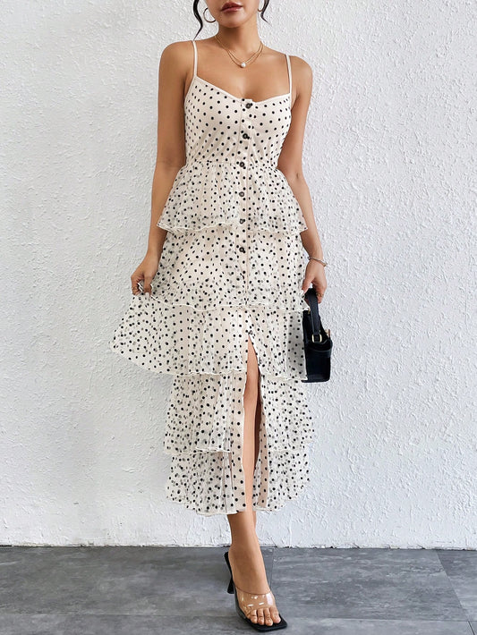 Introducing our Polka Dot Mesh Printed Layered Cake <a href="https://canaryhouze.com/collections/women-dresses" target="_blank" data-mce-href="https://canaryhouze.com/collections/women-dresses">Dress</a>, the perfect sweet treat for women! Made with a delicate and stylish polka dot mesh print, this dress is designed to flatter and highlight the feminine figure. The layered cake style adds a touch of playfulness to this elegant piece, making it a must-have for any wardrobe.