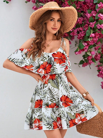 Elevate your summer wardrobe with our Tropical Bliss: Off-Shoulder Spaghetti Strap <a href="https://canaryhouze.com/collections/women-dresses" target="_blank" rel="noopener">Dress</a>. Perfect for vacation or a beach date night, this dress features an off-shoulder design and adjustable spaghetti straps for a flirty and comfortable fit. Feel the tropical vibes with this must-have dress.