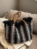 Stay stylish and organized for your beach days with our Summer Chic Straw <a href=
