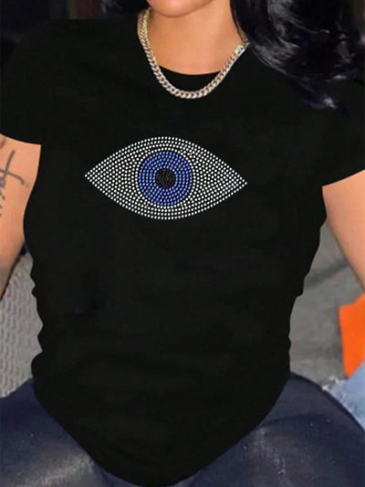 Elevate your style game with our Eyecatching Slayr T-Shirt. Featuring a sparkling rhinestone eye pattern, this shirt is sure to turn heads and make a statement. With its eye-catching design, you'll stand out from the crowd and add a touch of glamour to any outfit.