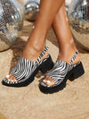 These Zebra Striped Style Round Toe <a href="https://canaryhouze.com/collections/women-canvas-shoes" target="_blank" rel="noopener">Sandals</a> are perfect for daily wear and the workplace. Made with a classic black and white design, these sandals offer both style and versatility. With their round toe shape, they provide comfort while adding a touch of sophistication to any outfit. Upgrade your wardrobe with these must-have sandals.