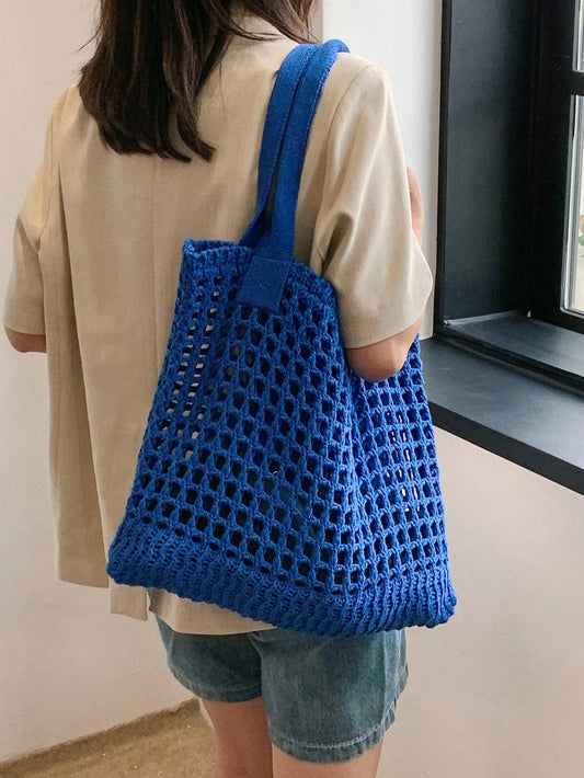 Elevate your style with our Chic and Stylish Hollow Out Knitted Shoulder <a href="https://canaryhouze.com/collections/canvas-tote-bags" target="_blank" rel="noopener">Tote Bag</a>. Made with high-quality materials, this bag boasts a solid color design and intricate hollow out details. The spacious interior and versatile shoulder straps make it perfect for everyday use. Upgrade your wardrobe today!