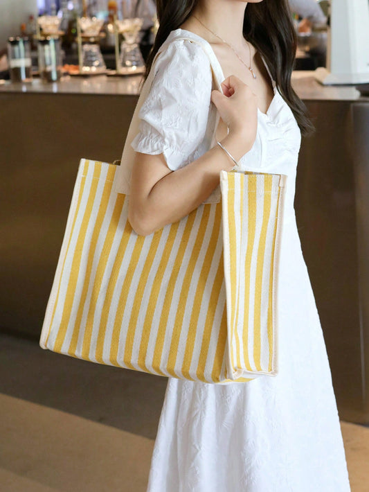 Introducing our Chic and Playful Striped Contrast Color <a href="https://canaryhouze.com/collections/canvas-tote-bags" target="_blank" rel="noopener">Tote Bag</a> for Women! Made with durable materials and a spacious interior, this bag is perfect for travel or everyday use. Its chic design and playful striped contrast add a touch of style while keeping your belongings safe and organized. Your ultimate companion for any occasion!