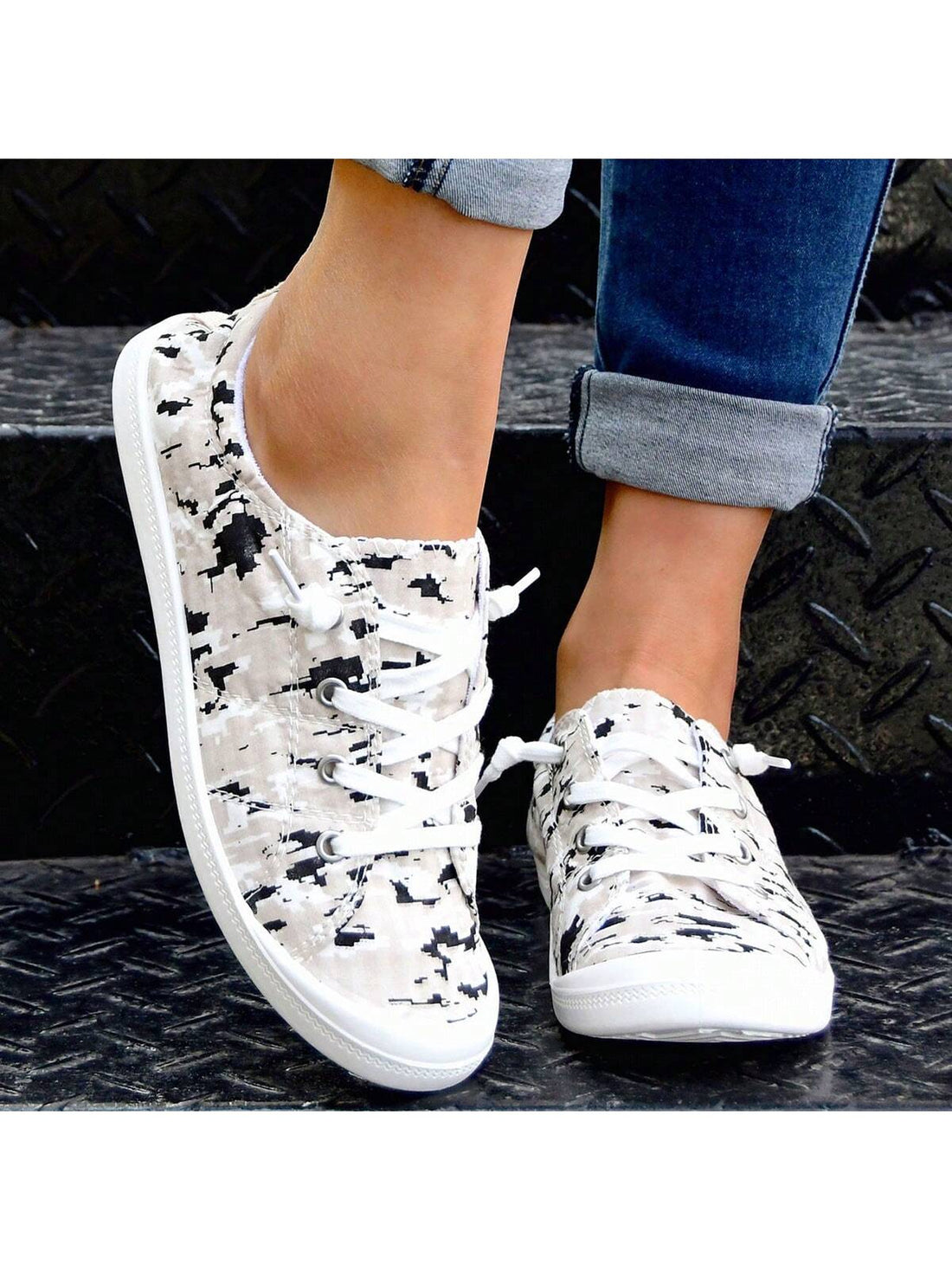 These Camouflage Pattern Low Top <a href="https://canaryhouze.com/collections/women-canvas-shoes" target="_blank" rel="noopener">Sneakers</a> provide ultimate comfort for running and casual outfits with their unique camouflage design and optimal support. Perfect for long walks or daily commutes, these sneakers offer a balance between style and functionality. Stay comfortable and stylish all day long.