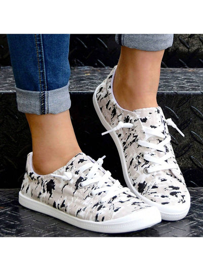 These Camouflage Pattern Low Top <a href="https://canaryhouze.com/collections/women-canvas-shoes" target="_blank" rel="noopener">Sneakers</a> provide ultimate comfort for running and casual outfits with their unique camouflage design and optimal support. Perfect for long walks or daily commutes, these sneakers offer a balance between style and functionality. Stay comfortable and stylish all day long.