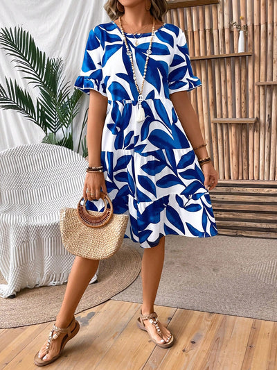 Discover your new summer staple with our Botanical Beauty Tiered <a href="https://canaryhouze.com/collections/women-dresses" target="_blank" rel="noopener">Dress</a>. Made from high-quality fabric, this dress features a flattering tiered design that will elevate your style. Perfect for any occasion, this dress is a must-have for your summer wardrobe.