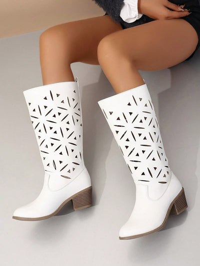 Introducing Western Chic: Embroidered Chunky Heel <a href="https://canaryhouze.com/collections/women-boots" target="_blank" rel="noopener">Boots</a> for the Fashionable Woman. These stylish boots combine western flair with a trendy chunky heel for a versatile and fashion-forward look. Crafted with beautiful embroidered details, they are perfect for adding a touch of sophistication to any outfit. Elevate your style with these must-have boots.