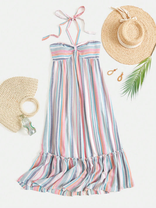 Update your summer wardrobe with our Chic and Colorful maxi dress! Designed with multicolor vertical stripes and a halter neck, this dress is perfect for a day at the beach or a night out. Made from lightweight material, it offers a stylish and comfortable fit. Show off your fashion-forward style with this trendy dress.