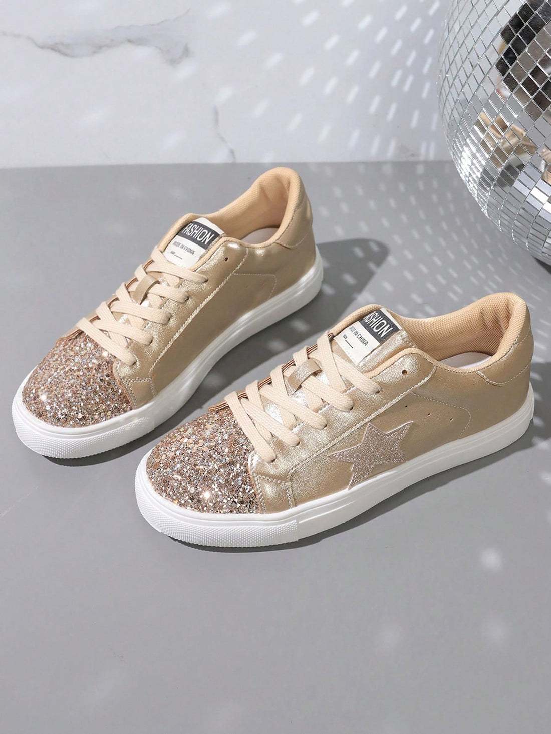 Stylish and versatile, these Golden Star Patch <a href="https://canaryhouze.com/collections/women-canvas-shoes" target="_blank" rel="noopener">Sneakers</a> are the ultimate fashion statement for every season. With a unique star patch design, these sneakers are perfect for adding a touch of glamour to any outfit. Whether you're dressing up for a special occasion or keeping it casual, these sneakers are sure to make a statement.