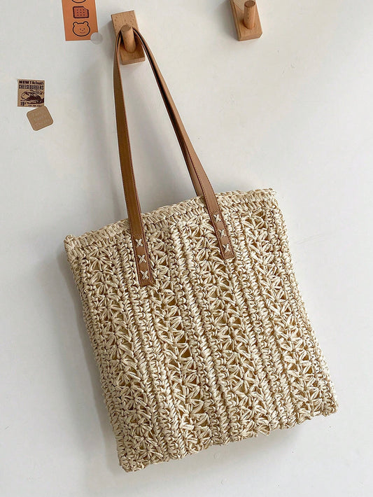 Elevate your spring and summer style with our chic and trendy handwoven straw <a href="https://canaryhouze.com/collections/canvas-tote-bags" target="_blank" rel="noopener">tote bag</a>. Expertly crafted, this bag is perfect for any occasion. The lightweight straw material adds a touch of natural elegance while the spacious interior and sturdy handles make it both stylish and functional. A must-have for the fashion-forward individual.
