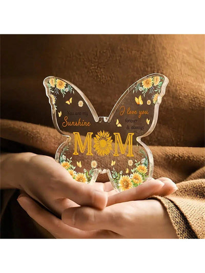 This Exquisite Butterfly <a href="https://canaryhouze.com/collections/acrylic-plaque" target="_blank" rel="noopener">Acrylic</a> Plaque makes for a thoughtful and heartfelt gift for any mom. With its stunning butterfly design and durable acrylic material, it is sure to be a cherished addition to any home. Show your appreciation and love for mom with this elegant and unique plaque.