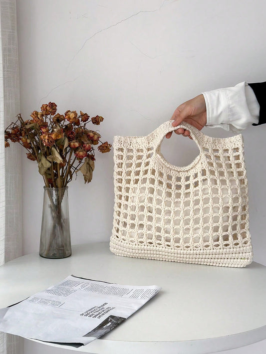 Stay stylish and organized with our Summer Chic Hollowed-Out Casual Knitted <a href="https://canaryhouze.com/collections/canvas-tote-bags" target="_blank" rel="noopener">Handbag</a>. Perfect for beach days, this bag features a unique hollowed-out design and sturdy knitted material. Keep your essentials secure while looking effortlessly chic.