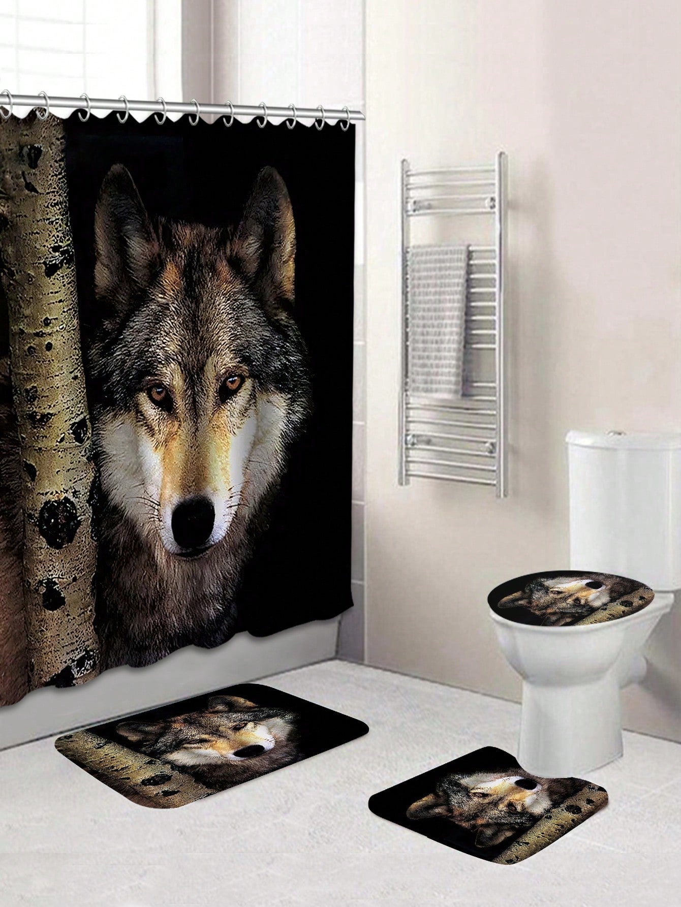 Upgrade your bathroom with our Wolf Design Bathroom Set. This set includes a waterproof <a href="https://canaryhouze.com/collections/shower-curtain" target="_blank" rel="noopener">shower curtain</a>, toilet cover, and bathroom mat, complete with 12 shower curtain hooks. Enjoy functional and stylish bathroom accessories that will elevate your daily routine.