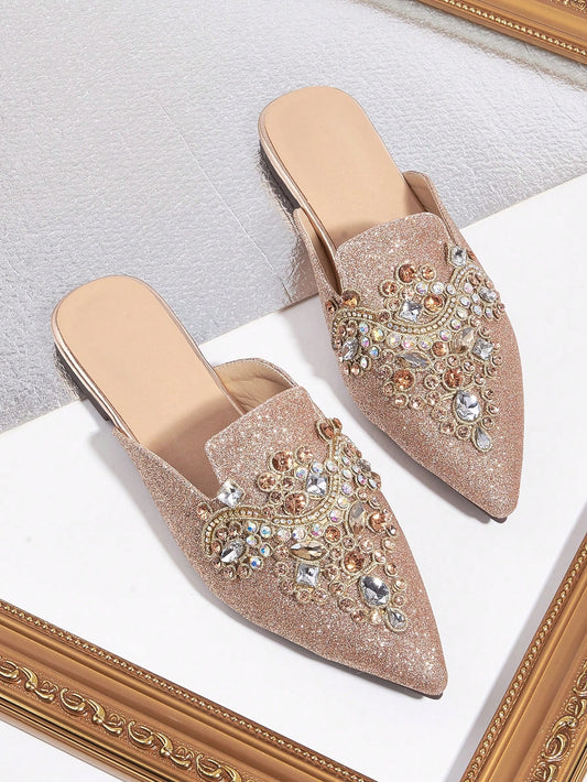 These sparkling rose gold embroidered flats are handmade with intricate rhinestone decor and unique embroidery stone colors. Elevate your style with these elegant and one-of-a-kind flats, perfect for any occasion. The handmade craftsmanship ensures high quality and attention to detail.