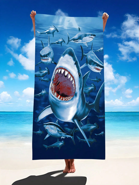 Elevate your beach experience with our Vibrant Shark Printed <a href="https://canaryhouze.com/collections/towels" target="_blank" rel="noopener">Beach Towel</a>. Oversized for maximum coverage and quick-drying for convenience, it's perfect for summer fun. The unique shark print adds a playful touch while the high-quality material ensures long-lasting use. Get ready to make a splash this summer!