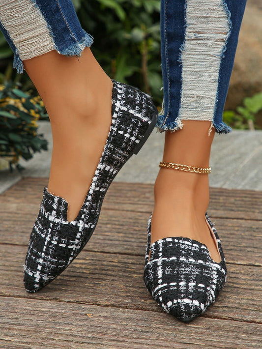 These Chic Black Plaid Pattern Pointed <a href="https://canaryhouze.com/collections/women-canvas-shoes" target="_blank" rel="noopener">Toe Flats</a> are perfect for the Spring and Autumn seasons. The stylish pointed toe adds sophistication, while the plaid pattern adds a touch of charm. The versatile flats can be dressed up or down for any occasion.