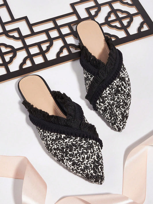 Elevate your style with our Bohemian Chic: Black and White Woven Face Flat <a href="https://canaryhouze.com/collections/women-canvas-shoes" target="_blank" rel="noopener">Shoes</a>. The pom pom tassel decoration adds a playful touch to these versatile shoes. Crafted with high-quality materials, these shoes offer both comfort and fashion. Perfect for any occasion, these flats are a must-have for any wardrobe.