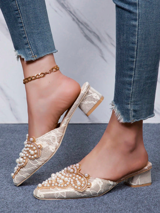 Elevate your summer style with our Luxe Lace Chunky <a href="https://canaryhouze.com/collections/women-canvas-shoes" target="_blank" rel="noopener">Heel Slippers</a>. Made with premium lace, these slippers offer both sophistication and comfort. The chunky heel provides stability, while the lace adds a touch of elegance to any outfit. Achieve the ultimate summer style statement with our Luxe Lace Chunky Heel Slippers.