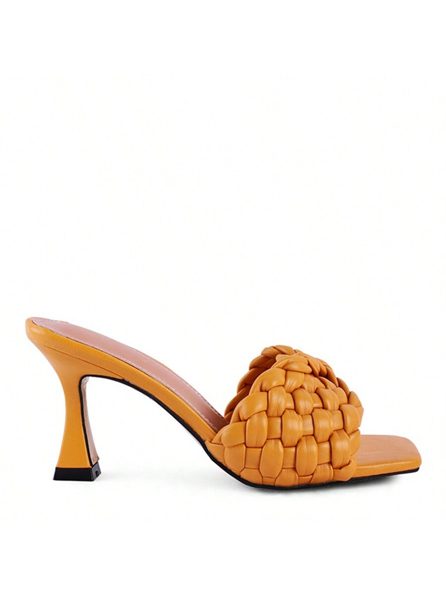 Introducing our stylish and comfortable Celie Woven Strap Mid-Heel <a href="https://canaryhouze.com/collections/women-canvas-shoes" target="_blank" rel="noopener">Sandals</a>. Designed with a woven strap for a unique look and mid-heel for all-day comfort. Perfect for any occasion, these sandals combine fashion and function for a must-have addition to your footwear collection.