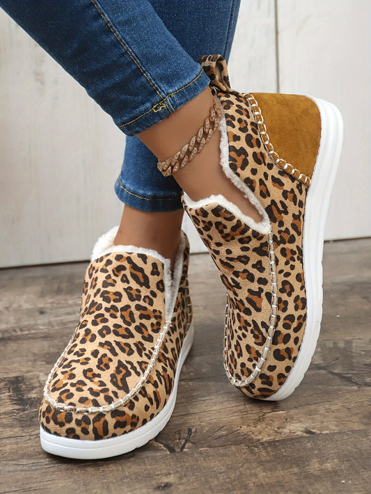 Be cozy and stylish in these leopard print fuzzy slip-on shoes. Crafted from a soft fuzzy fabric, these shoes offer warmth and are perfect for the winter season. The classic leopard print adds a unique style to your wardrobe.
