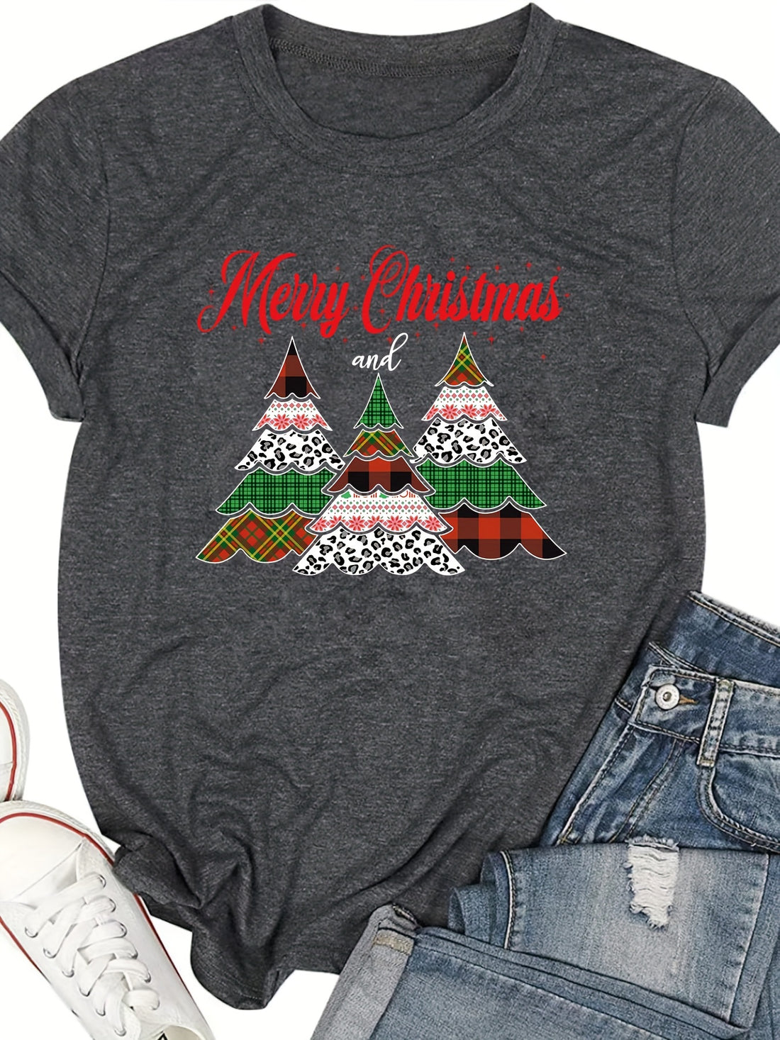 This Festive Delight T-Shirt features a colorful Christmas tree print with a classic crew neck styling. It's made from a comfortable poly/cotton blend and is perfect for holiday parties and celebrations.