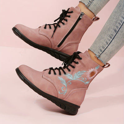 These Floral Delight women's boots are designed for fashionable comfort. Crafted with embroidered accents, these short boots provide a chic look and maximum breathability. Their built-in support system ensures practical use while delivering impressive durability. Perfect for any outfit.