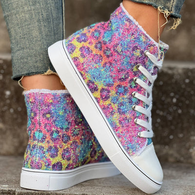 Step into these vibrant leopard-pattern canvas shoes. Crafted with a glittery sequin print and lace-up closure for optimal comfort and style, the round toe and luxurious texture make this an essential fashion favorite.