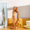 Enhance the aesthetic of your home or office with this Golden Yoga Goddess Ornament. Featuring exquisite craftsmanship, this elegant statue exudes a sense of tranquility and mindfulness. Made with high-quality materials, it will bring an air of sophistication to any space. Enhance your surroundings with this beautiful and meaningful piece.