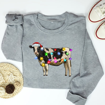 This Cow Print Pullover Sweatshirt is the perfect way to stay warm and cozy during the colder months. The design is both stylish and comfortable, with a soft fabric that keeps you insulated from the elements..