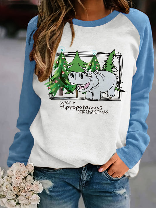 Stay warm and stylish this holiday season with our Holiday Bliss Christmas Hippo Tree Print Pullover Sweatshirt! Made from cozy material, this sweatshirt features a playful hippo and tree print, adding a touch of festive charm to your winter wardrobe. Perfect for any winter occasion, it's a must-have addition for the season.