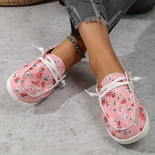 Add a classic, feminine look to your wardrobe with the Blooming Elegance Women's Floral Print Canvas Shoes. These slip-on flat sneakers feature a floral print upper with a durable rubber sole, providing superior comfort and slip resistance.