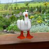 This Lucky Duck Hand Gesture Statue is a unique addition to your garden and holiday decor. Made with a creative hand gesture, it brings a touch of fun and whimsy to any space. Its sturdy design can withstand various weather conditions, making it a durable and long-lasting decoration.