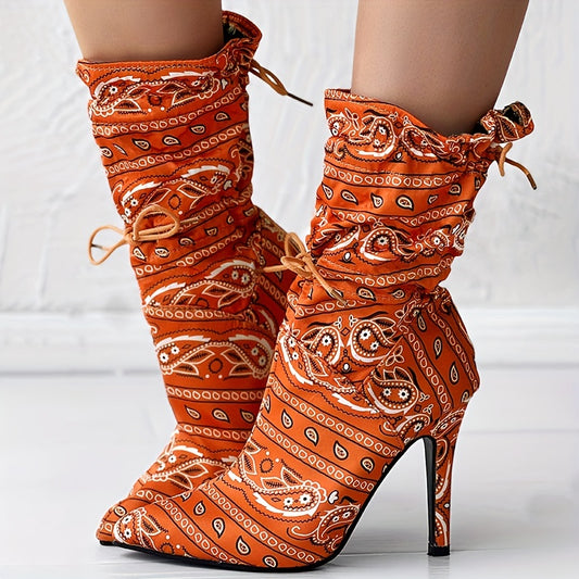 Step out in style in our Vibrant Paisley Print Boots. These trendy lace-up stilettos feature a vibrant paisley pattern that brings a playful element to any look. With superior comfort, you can enjoy confident strides all day long.