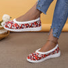 Festive and Cozy: Women's Cartoon Santa Claus Slip-On Shoes for a Comfy Christmas