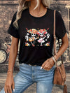 Rockin' Skulls: Women's Casual Short Sleeve T-Shirt with Halloween Guitar Pattern