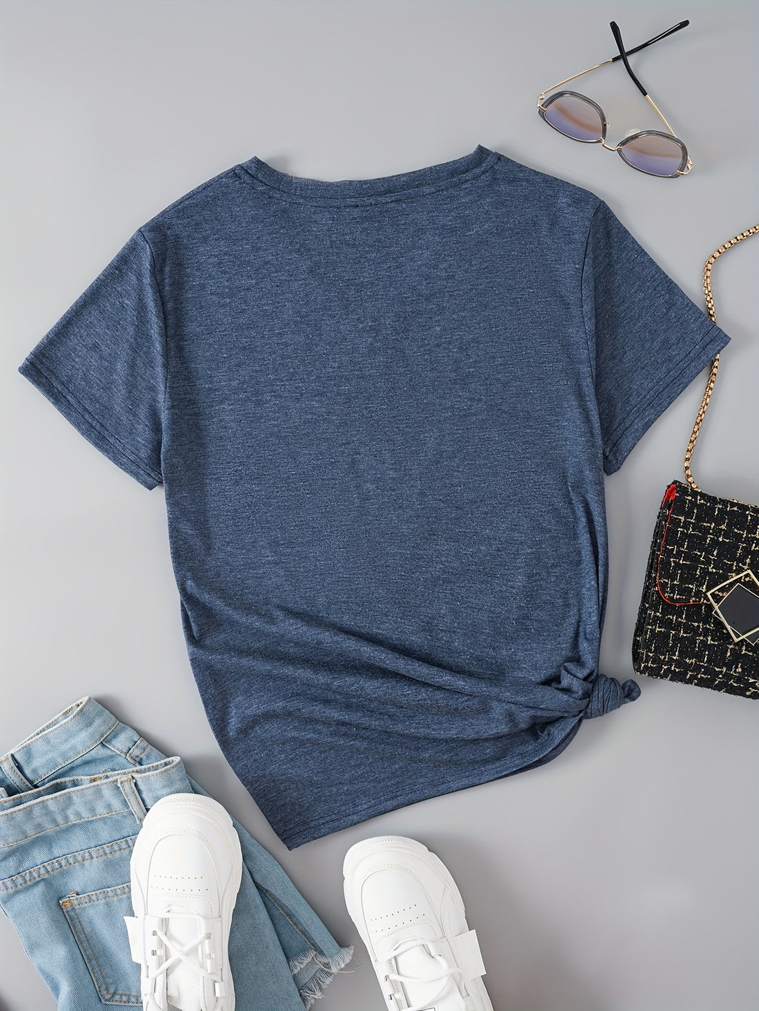 Add a playful touch to your spring and summer wardrobe with our Moo-rific Cow Print V-Neck T-Shirt. This stylish and casual shirt is perfect for any casual occasion, with a flattering v-neck design and trendy cow print pattern. Made with high-quality materials for long-lasting comfort and style.