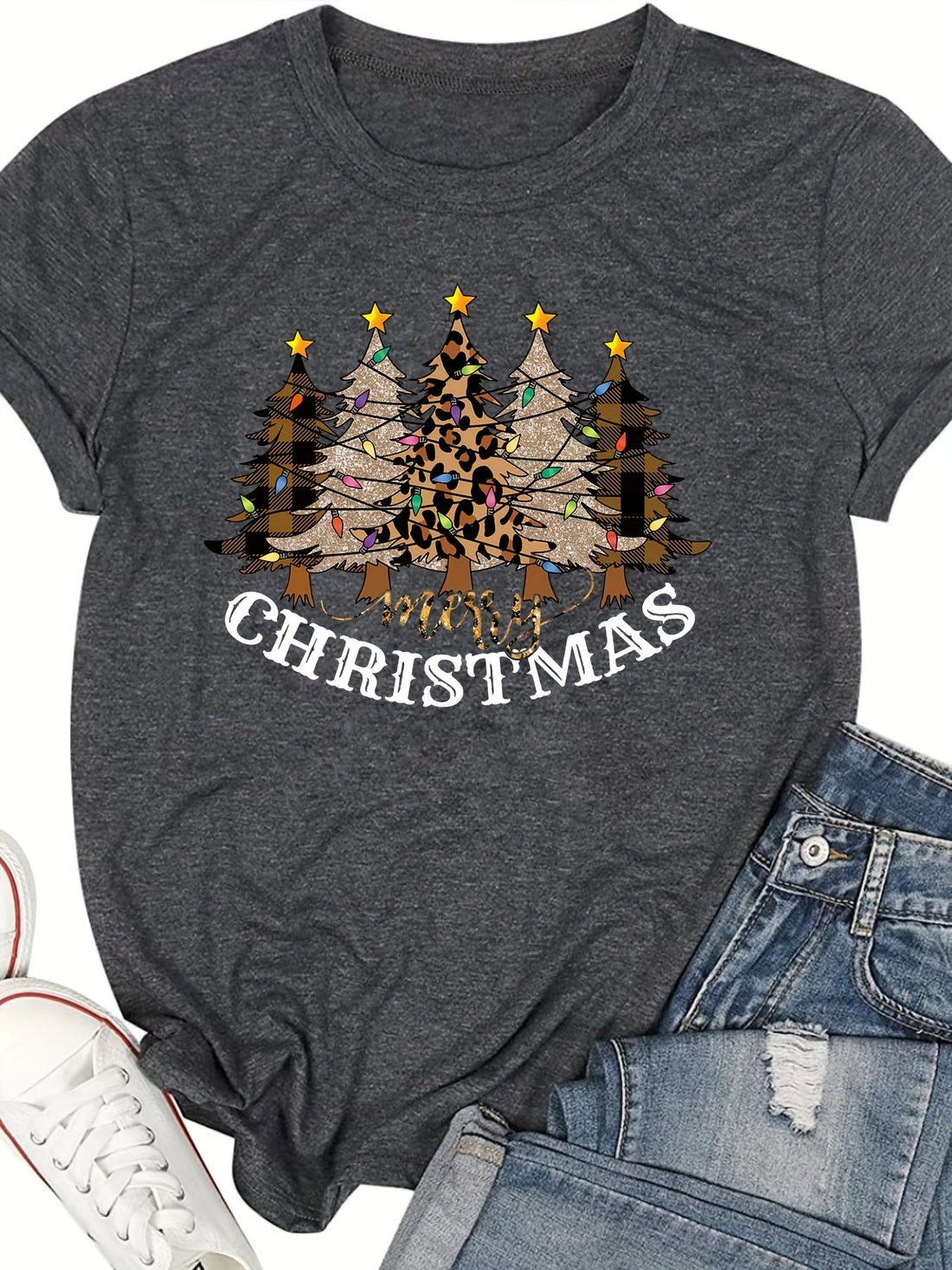 Women can look both stylish and festive this holiday season in the Leopard Christmas Tree Pattern Tshirt. This short sleeve crew neck T-shirt features a unique leopard Christmas tree pattern that is sure to get you noticed. Make a statement in your holiday wardrobe.