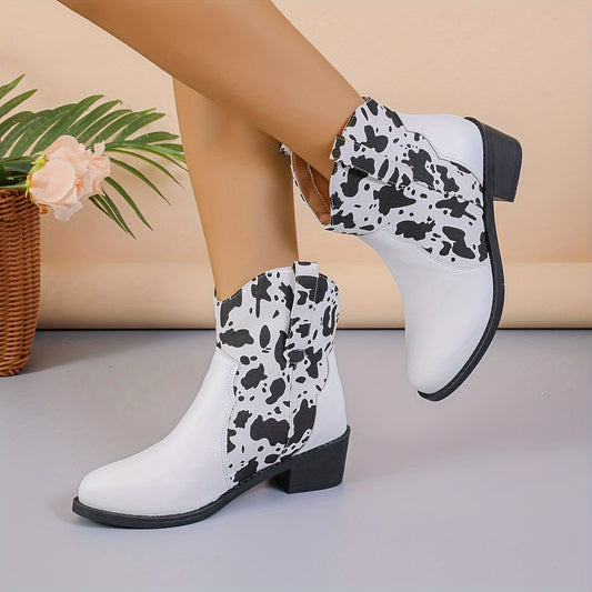 Discover your new fashion favorite with these stylish and versatile cow pattern boots. Featuring a slip-on design and western-inspired chunky heel, these comfy boots are perfect for creating a trendy look. Go from work to night out in style.
