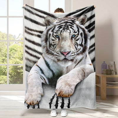 This stylish blanket brings a wild touch of nature to your home. Crafted with ultra-soft microfibers, the Cozy and Stylish Tiger Print Blanket lets you relax in total comfort. It features a stunning white tiger print design that adds a unique, sophisticated flair to your decor. Enjoy unmatched coziness and style with this special blanket.