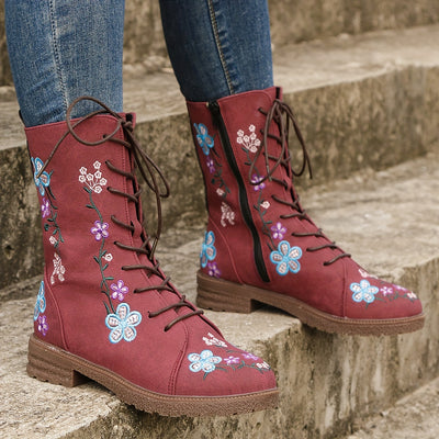 These Retro Mid-Calf Boots add a unique touch to any outfit, crafted with a leather upper and floral embroidery detail. Lace-up with a side zipper closure to ensure a comfortable fit and step out in style!