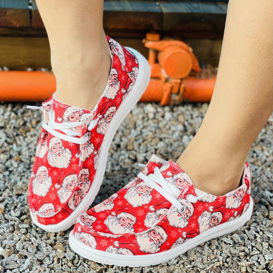 Experience comfort and festive cheer with these lightweight canvas shoes for women, featuring a fun Santa Claus pattern and secure lacing. With breathable cotton material and a reinforced sole for enhanced strength, you can enjoy the holiday season in style.