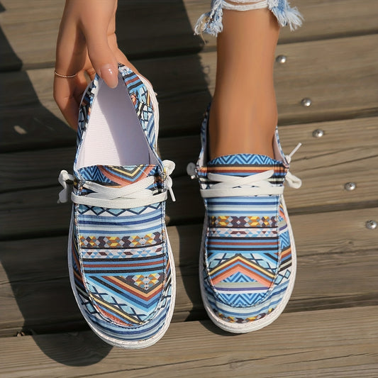 Look stylish and stay comfortable in these Women's Tribal Style Pattern Flat Canvas Shoes. Crafted with canvas material, these walking shoes are lightweight and breathable for all-day comfort. The fashionable tribal pattern and casual sneaker design provides a unique, fashion-forward look.