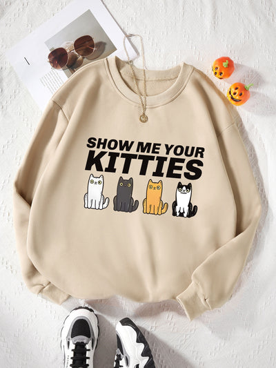 Stay comfortable while showing off your love for felines in our Cute and Cozy Women's Cat Print Pullover Sweatshirt. Made for casual wear, this sweatshirt features a cute cat print design that will bring a touch of whimsy to your wardrobe. Stay warm and stylish with this must-have piece.