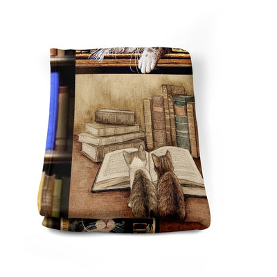 This luxurious blanket is a warm and cozy reminder of the joys of spending time with cats and books. Crafted from high-quality material with a soft wool-like feel, it will instantly become a treasured favorite. The perfect gift for anyone who loves cats and books.
