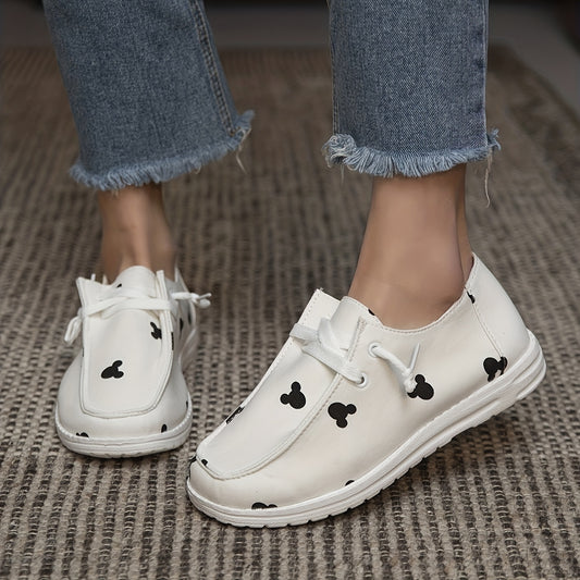 Make a fashion statement with these lightweight canvas shoes featuring Mickey cartoon prints. Lace-up closure ensures a secure, comfortable fit for all-day wear. Plus, the durable canvas material is lightweight for day-long comfort. Get ready to step out in style.