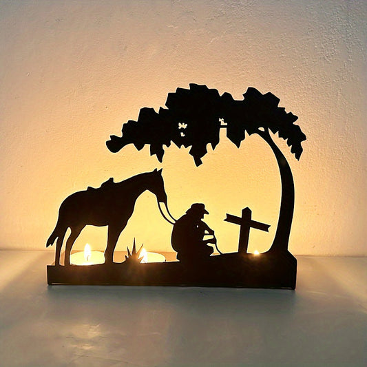 Elevate your home decor with the Black Cowboy Prays and Mourns Candlestick. Made of exquisite iron, this candlestick adds a touch of rustic charm with its depiction of a cowboy in prayer. Perfect for any room, it not only serves as a functional candle holder but also as a unique piece of art.