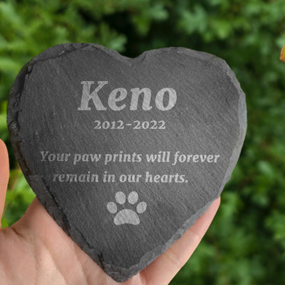 Pay tribute to your beloved pet with this custom engraved pet memorial stone. Crafted from durable resin, this personalized pet grave stone is designed to weather various outdoor conditions. Great for personalizing your pet's memory, this memorial stone will serve as a touching reminder of your pet’s life.