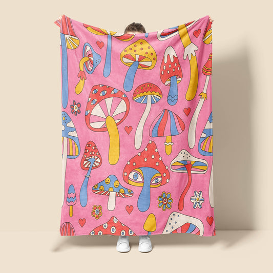 This plush and cozy flannel blanket features a fun cartoon mushroom design, perfect for snuggling or as a decorative accent in any home. Its lightweight material is suitable for all seasons, and makes a great gift for both kids and adults.